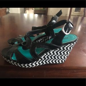 Brand new scrappy black wedge heels never worn